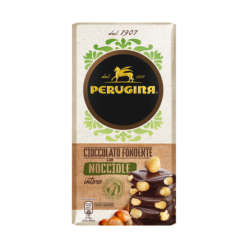 Scopri il gusto inimitabile della tavoletta di cioccolato fondente con nocciole intere Tavoletta di cioccolato fondente con nocciole intere