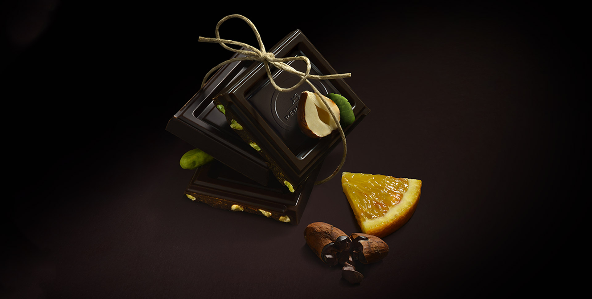 Ingredienti Cioccolato Nero Perugina: arancia, pistacchi e nocciole